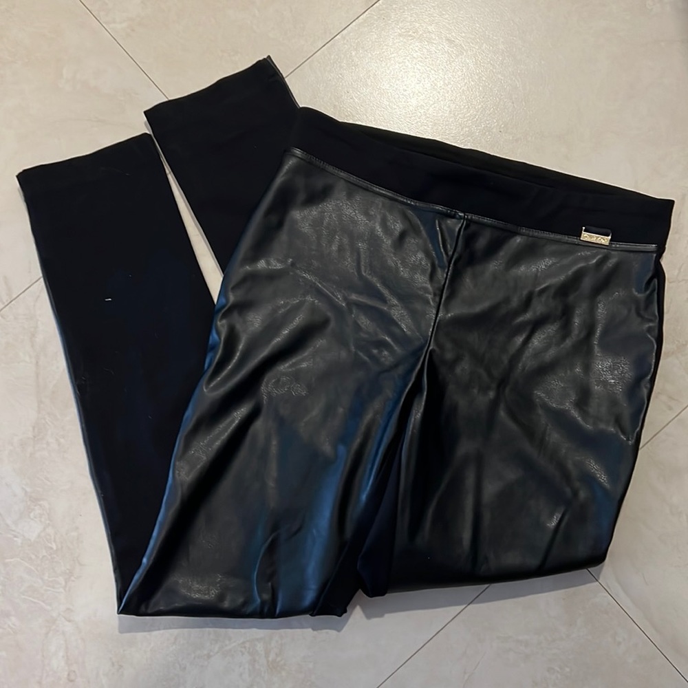 Calvin Klein stretch pants with Faux leather front.